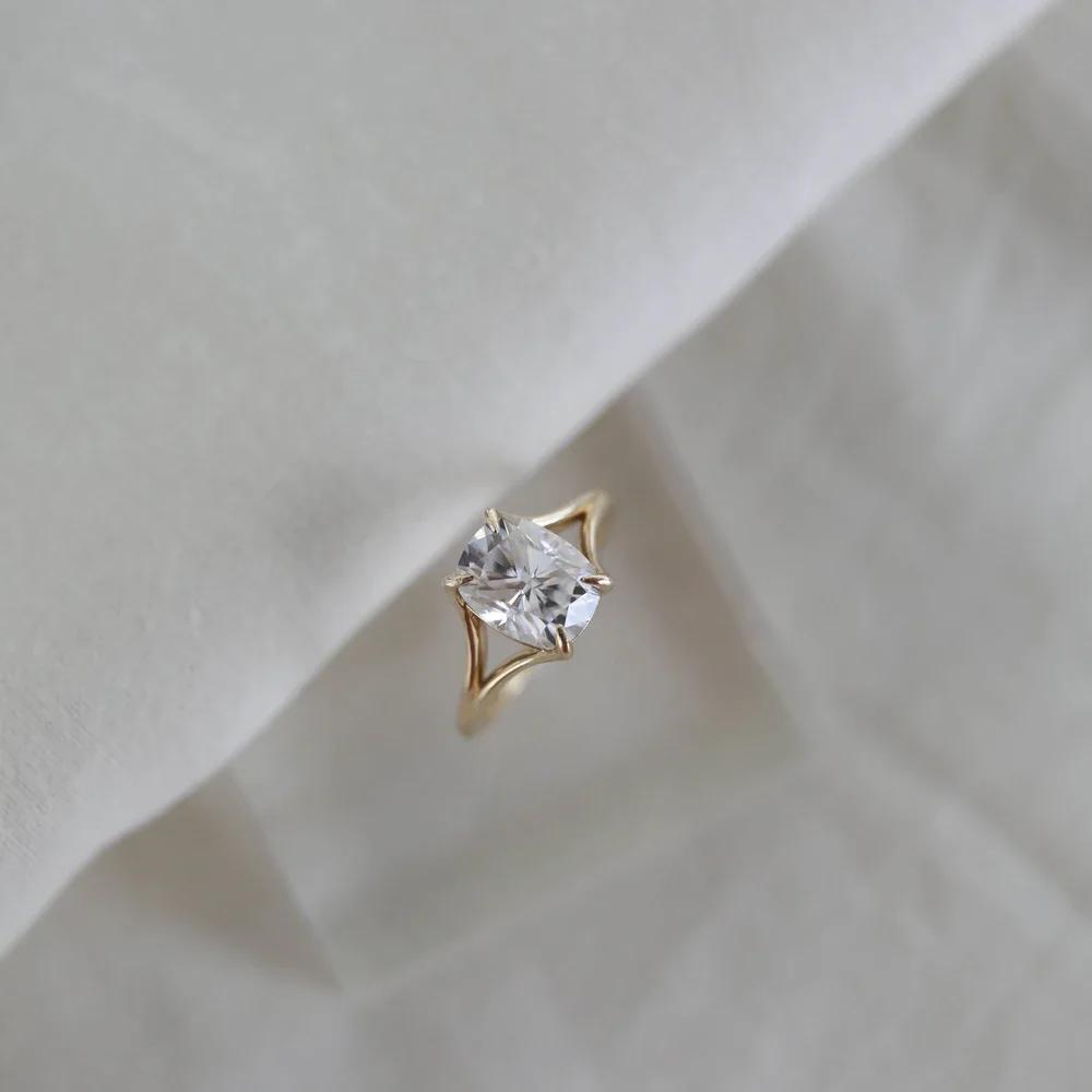 Cushion Cut Moissanite Engagement Ring In Yellow Gold With Split Shank Solitaire Design. Perfect Wedding Or Promise Ring For Her.