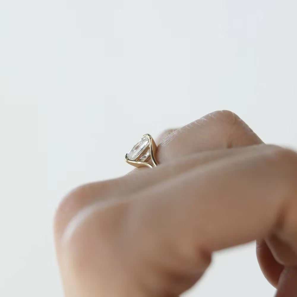Cushion Cut Moissanite Engagement Ring In Yellow Gold With Split Shank Solitaire Design. Perfect Wedding Or Promise Ring For Her.
