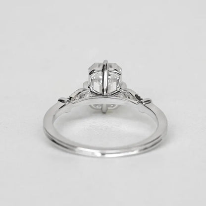 Elegant Emerald Cut Solitaire Engagement Ring In White Gold With Dainty Accent Stones. A Timeless Moissanite Wedding Or Promise Ring For Her
